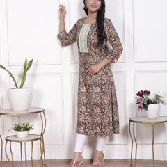 Miramaar Women's Green Lace Work Round Neck Straight Rayon Kurti