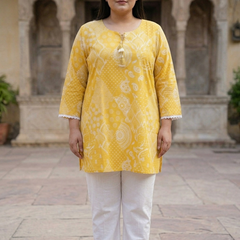 Miramaar Women's Yellow Printed Cotton Short Kurti