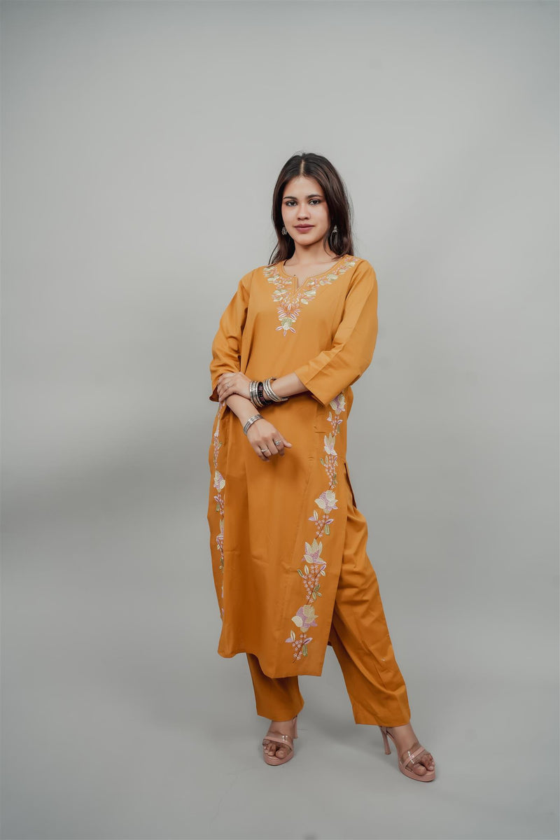 Miramaar Women's Yellow Cotton Embroidered Round Neck Solid Kurta Set