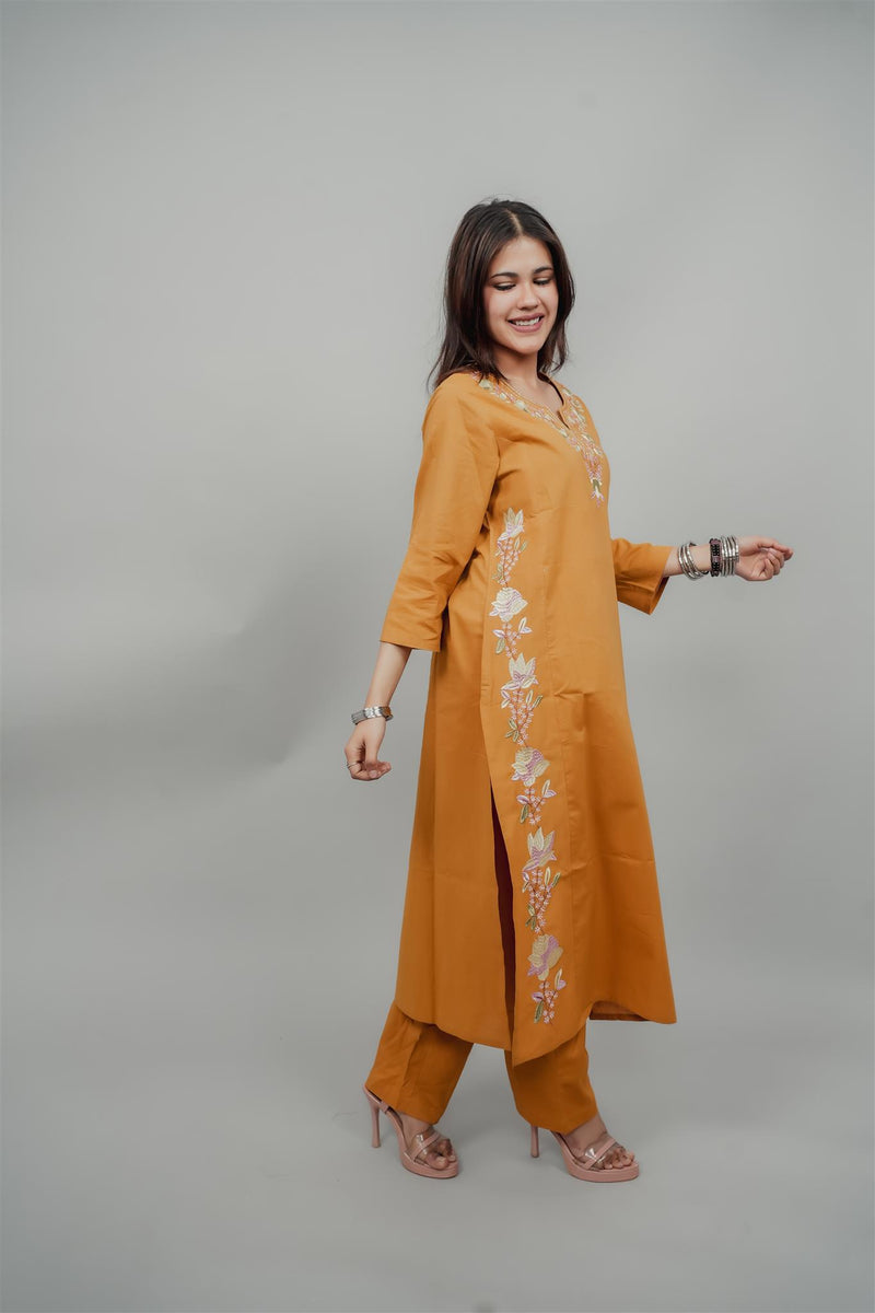 Miramaar Women's Yellow Cotton Embroidered Round Neck Solid Kurta Set